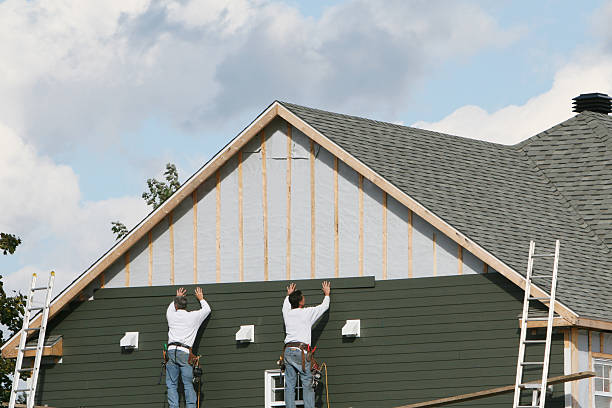 Professional Emergency Siding Repair technician working in Summerfield, NC